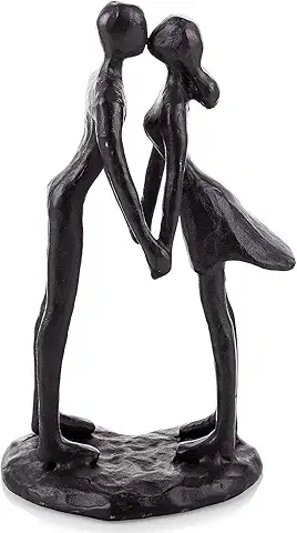 A minimalist dark bronze or cast iron sculpture of a man and a woman holding hands and kissing, mounted on a rustic circular base against a white background.