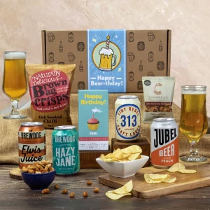 A premium birthday craft beer selection and savory snack gift hamper presentation.