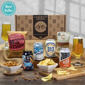 A best-selling craft lager selection and savory snack gift hamper presentation.