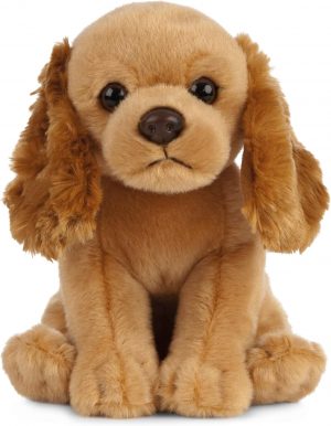 A plush cocker spaniel puppy stuffed animal sitting upright.