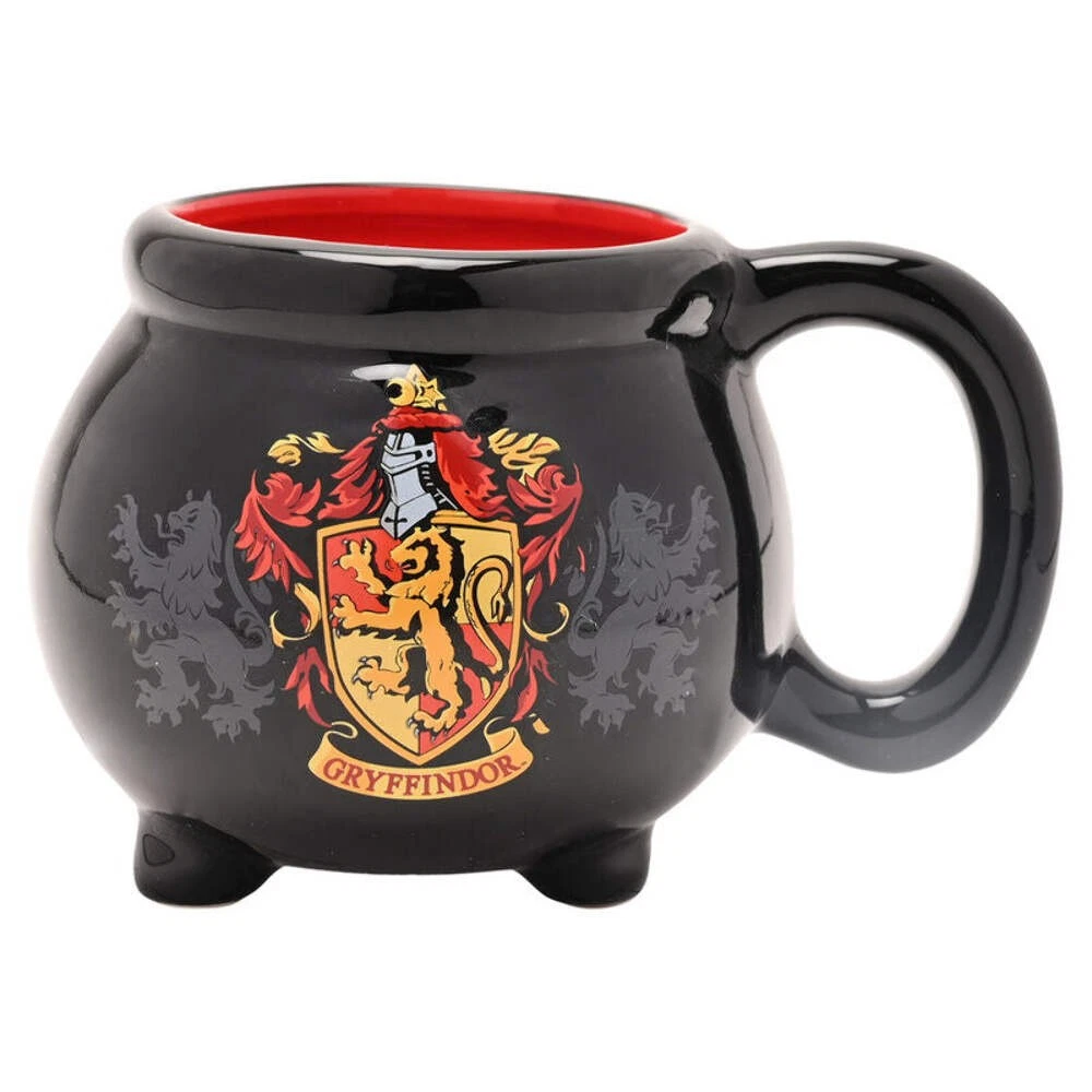A Harry Potter Gryffindor ceramic mug shaped like a potion cauldron.
