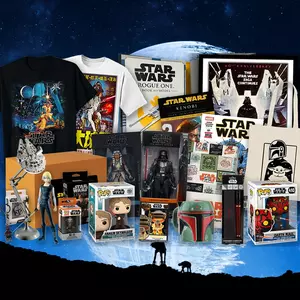An ultimate collection of Star Wars gear and collectibles from a subscription box, featuring iconic characters from across the saga like Darth Vader, Boba Fett, and Anakin Skywalker.