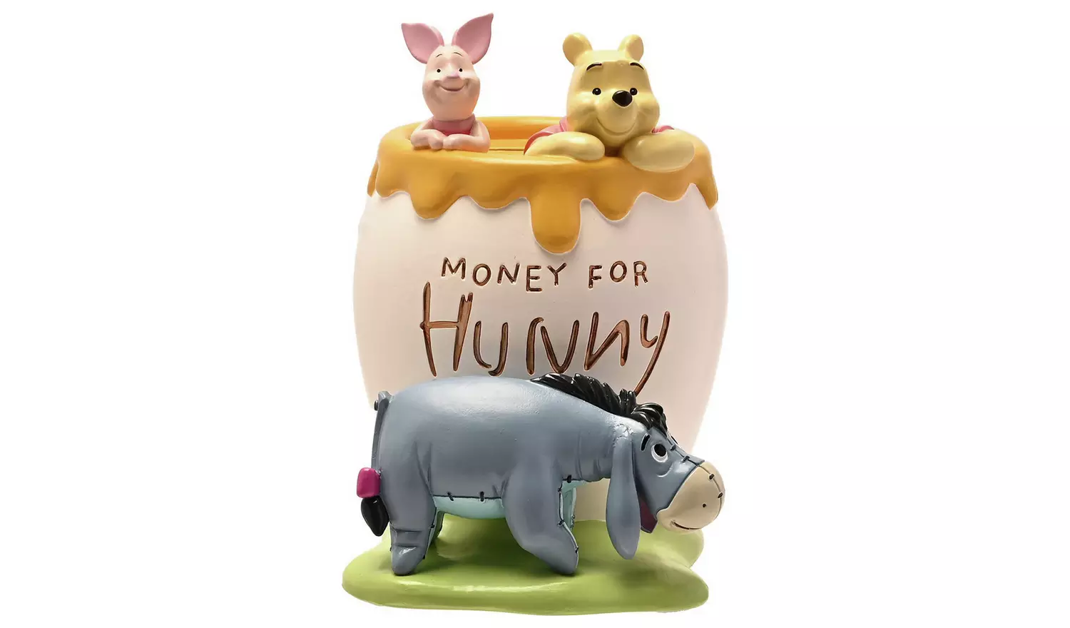 A Disney Winnie the Pooh ceramic piggy bank shaped like a honey pot.