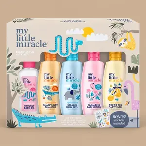 A "my little miracle" Essentials Gift Set featuring five colorful bottles of baby toiletries in a safari-themed display box against a beige background.