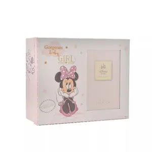 A white Disney Minnie Mouse Magical Beginnings Keepsake Box, featuring a vintage sketch of Minnie Mouse next to a built-in vertical photo aperture frame.