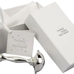 A polished, silver-plated dumbbell baby rattle displayed alongside its white gift box, gift tag, and a soft fabric storage pouch from the Twinkle Twinkle Baby Collection