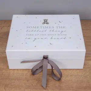 A white Bambino by Juliana Baby Keepsake Box with a grey grosgrain ribbon closure, featuring the quote "Sometimes the littlest things take up the most room in your heart."