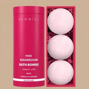 Packaging for NEW MIUZ Rose Magnesium Bath Fizzers showing a pink branded tube next to a box containing three rose, vanilla, and jasmine bath bombs.