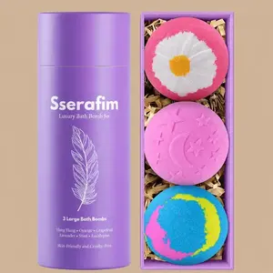 Packaging for the Sserafim Skin-Friendly Bath Bomb Set showing a purple branded tube next to a display box holding three decorative, multi-colored bath fizzers.