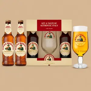 A Birra Moretti L'Autentica Beer & Glass Gift Set featuring two individual bottles next to a boxed presentation pack and a filled chalice glass.