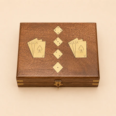 Polished rosewood card and dice box with decorative brass card and diamond inlays.