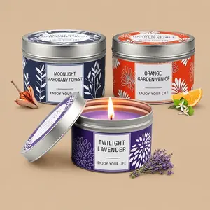 A 3-pack set of scented candle tins featuring Lavender, Mahogany, and Orange fragrances.