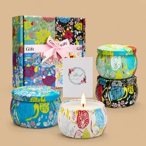 A colorful 4-pack floral travel tin scented candle gift box set with a greeting card.