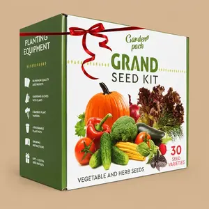 A green and white box for the Garden Pack Grand Seed Kit, decorated with a red ribbon and displaying an assortment of fresh vegetables and herbs.
