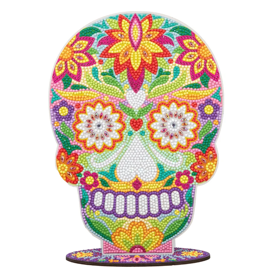 A vibrant Mexican-style sugar skull rhinestone craft kit featuring bright floral and geometric patterns made from sparkling gem dots.