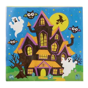A square paper party napkin featuring a vibrant Halloween illustration of a spooky haunted house with orange roofs, two friendly white ghosts, a full moon with a flying witch silhouette, and cartoon bats against a starry blue background.