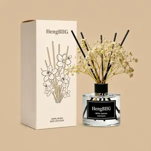A HengBIIG White Jasmine reed diffuser set featuring a clear glass bottle styled with black reeds, dried baby's breath, and a minimalist gift box.