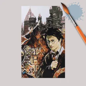 A completed Harry Potter Collage paint-by-numbers canvas art piece next to an orange paintbrush.