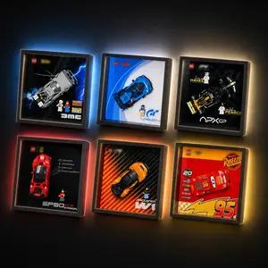 A collection of six individual, square black LEGO Speed Champions wall-mounted display frames arranged in a 3x2 grid against a dark background, each showcasing a different model vehicle with themed background graphics and a soft halo backlight.