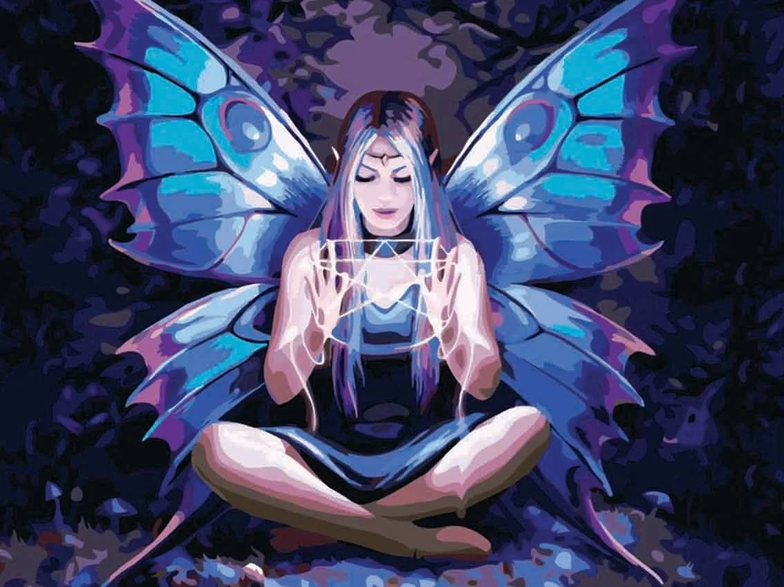 A completed paint-by-numbers canvas of "Spell Weaver" by Anne Stokes, showing a winged fairy sitting cross-legged and casting a spell.