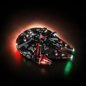 A LEGO Star Wars Dark Falcon set featuring custom LED lights that illuminate the cockpit, thrusters, and hull against a black background.