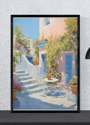 A framed vertical canvas painting depicting a sunlit Mediterranean courtyard with a white table and chairs set, a stone staircase, and a light pink building with bright blue doors surrounded by climbing plants.