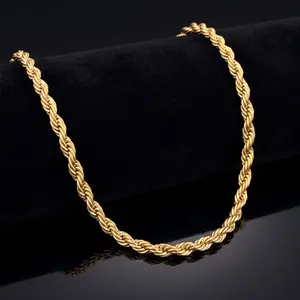A classic yellow gold rope chain necklace showcased on a black velvet display stand with a subtle reflection