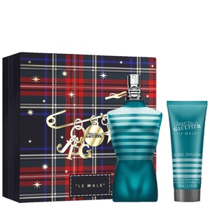 Jean Paul Gaultier Le Male holiday fragrance gift set featuring a tartan plaid box, torso-shaped perfume bottle, and matching shower gel.
