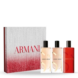 Giorgio Armani Sì collection gift set featuring a red and silver glitter gradient box alongside three travel-sized perfume vials in nude and red finishes.
