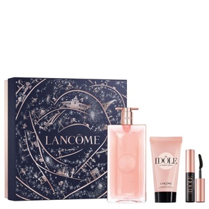 Lancôme Idôle beauty gift set featuring a navy blue and gold illustrated starry sky box, an ultra-slim pink perfume bottle, matching body cream, and a mini mascara.
