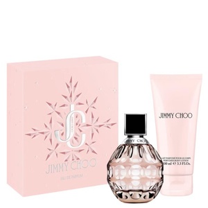 Jimmy Choo Original fragrance gift set with a pastel pink snowflake box, a rounded textured glass perfume bottle, and a matching pink tube of body lotion.