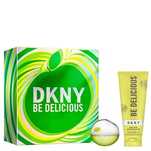 DKNY Be Delicious women's fragrance gift set featuring a vibrant green apple print presentation box, a round apple-shaped perfume bottle, and a matching yellow body lotion tube.