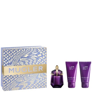 Mugler Alien fragrance set featuring a purple and gold starburst-patterned box, an amethyst-purple perfume bottle, a tube of body lotion, and a matching tube of shower gel.