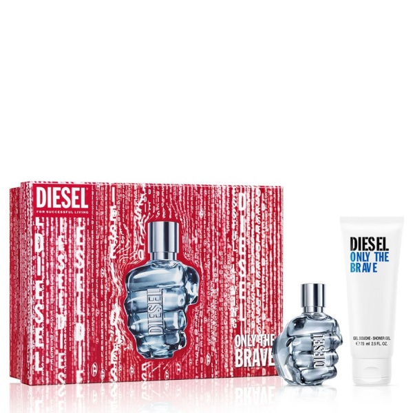 Diesel Only The Brave men's fragrance gift set with a red graphic box, a glass bottle shaped like a clenched fist, and a tube of matching shower gel.